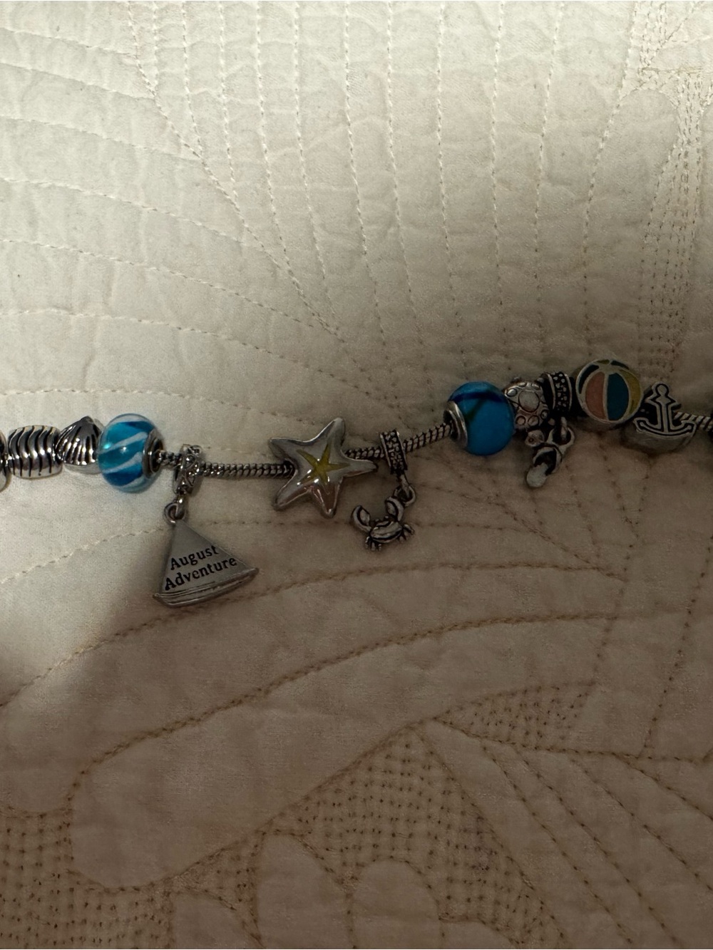 Silver Charm Bracelet with Blue Glass Accent Beads